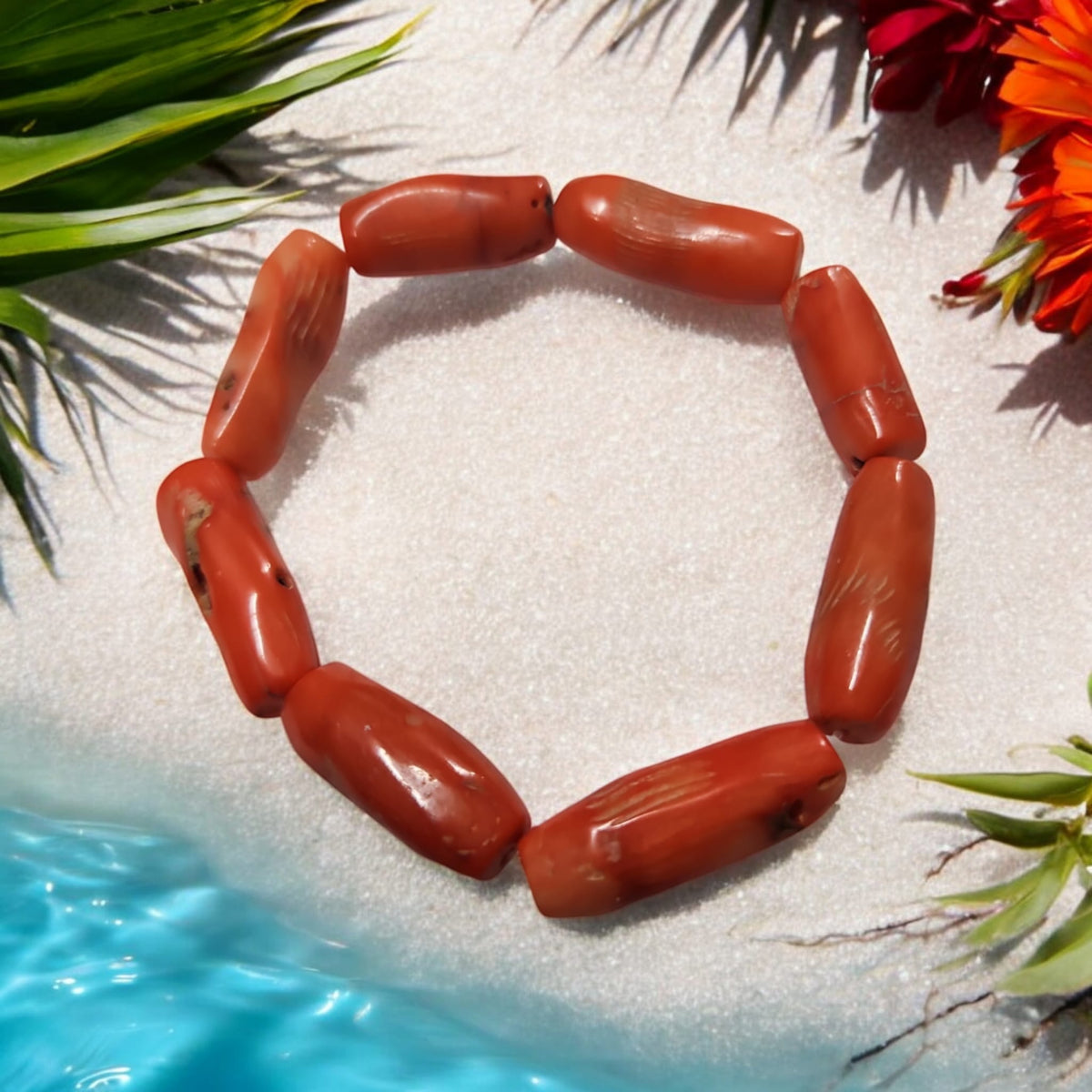 CORAL. Bracelet en perles de corall et pierres rouges naturelles.