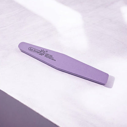 Pofessional nail buffer for shaping, smoothing and polishing natural or artificial nails.
