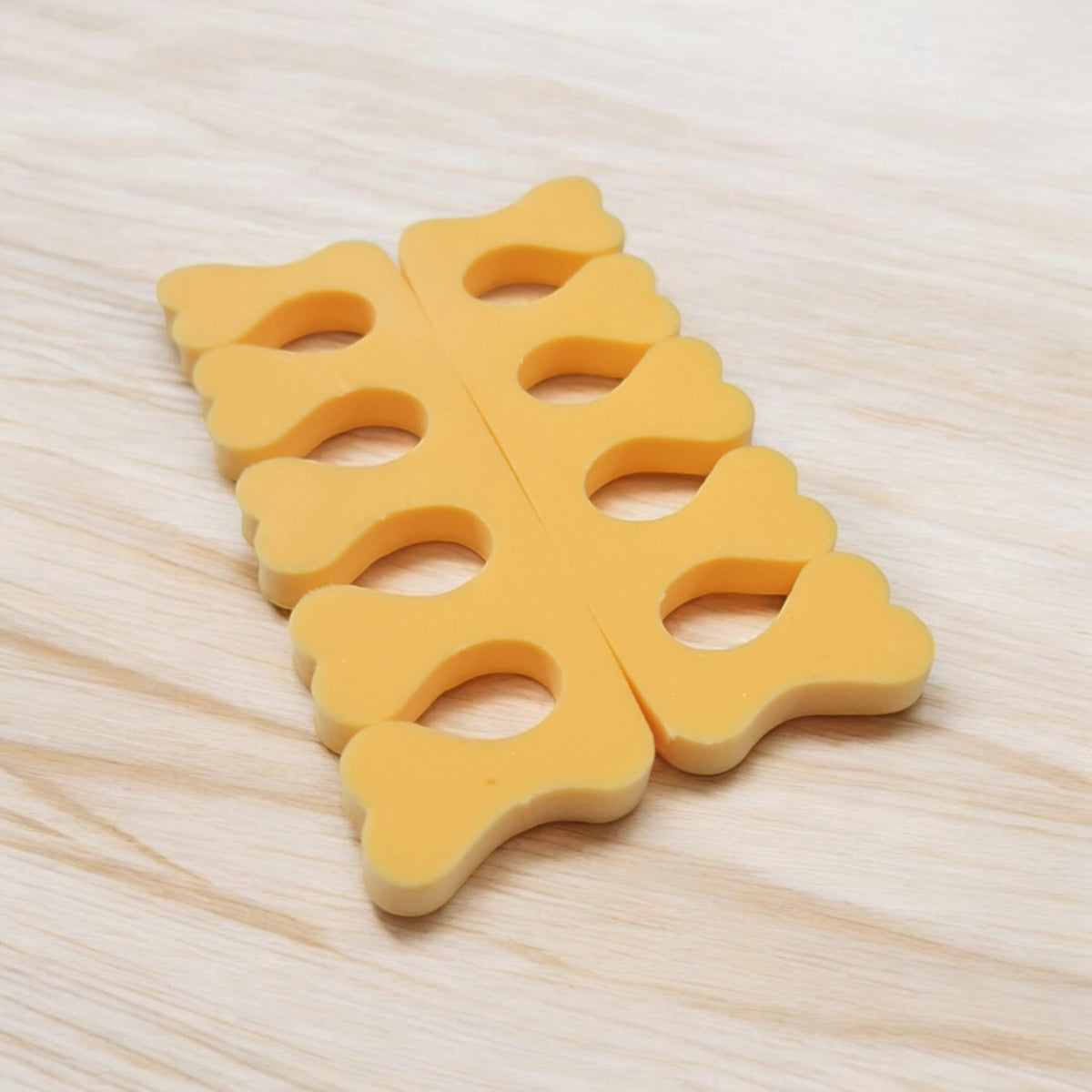 Soft foam toe separators for comfortable pedicures and easy nail polish application.