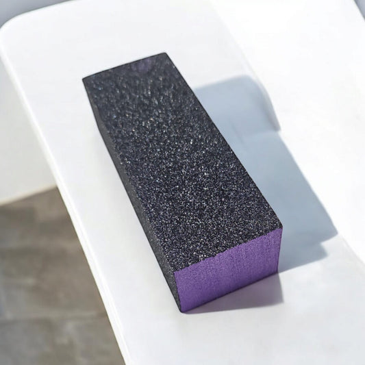 Professional nail buffer block for smoothing, shaping and polishing nails.