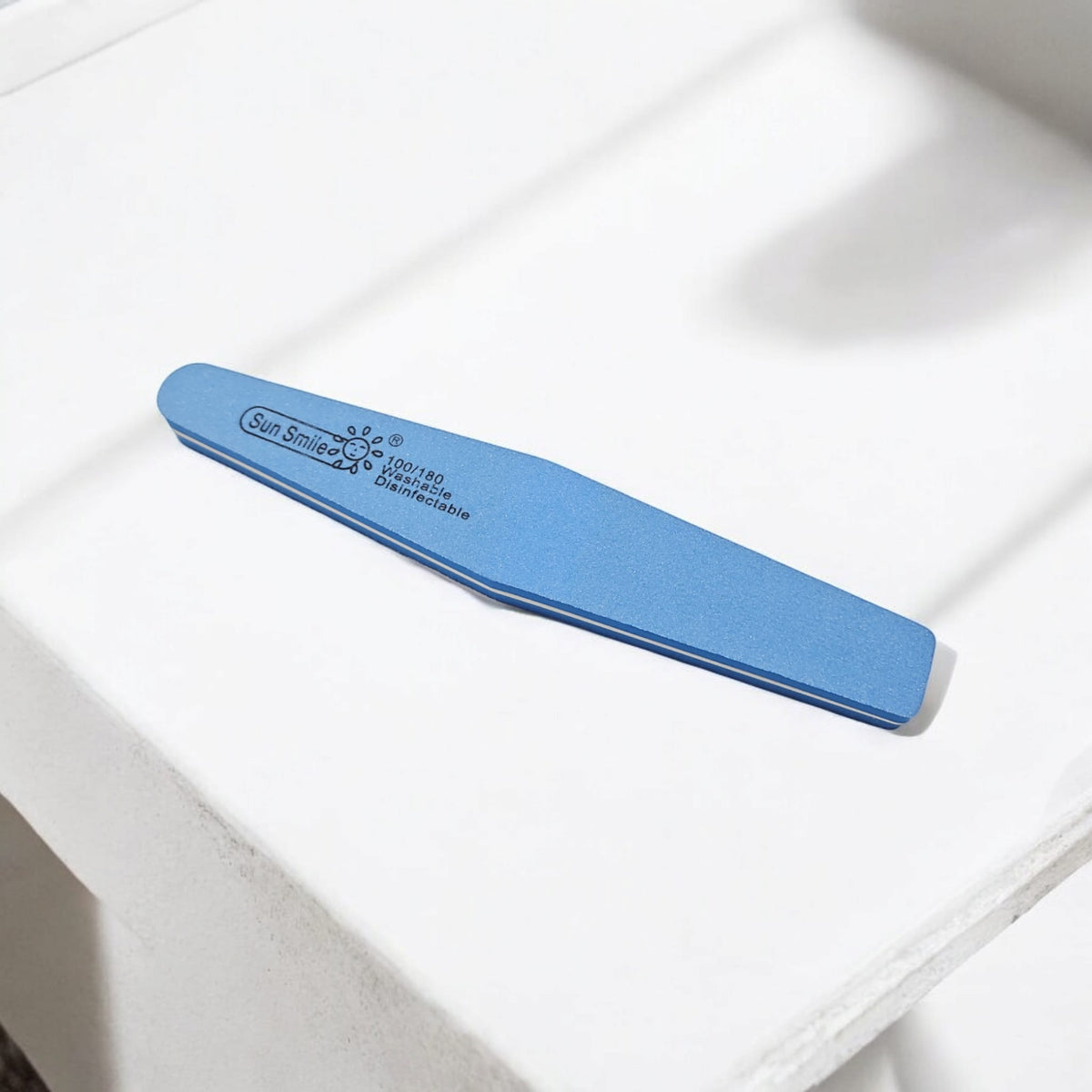 Pofessional nail buffer for shaping, smoothing and polishing natural or artificial nails.