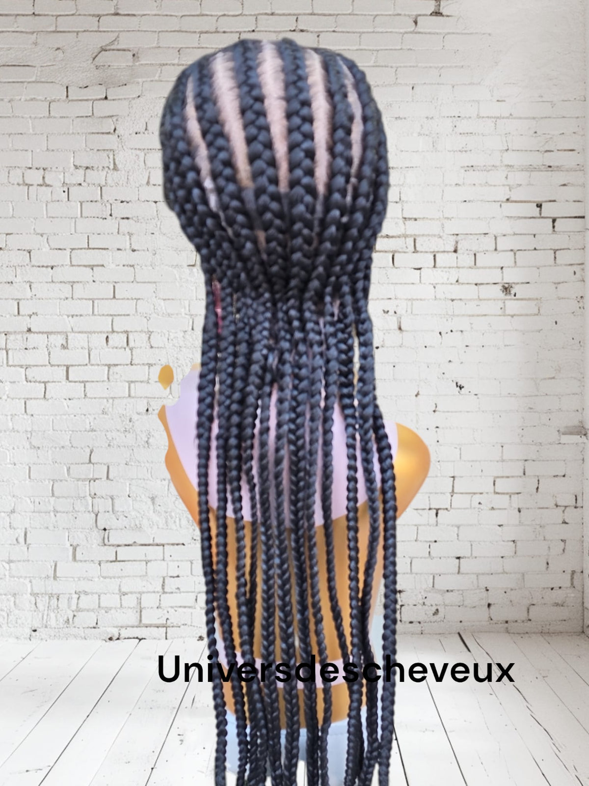 Perruque synthetique tressee plate (style  rastas) sans noeuds apparents, avec tulle frontal (lace front) et cheveux de bordure(baby hairs).
